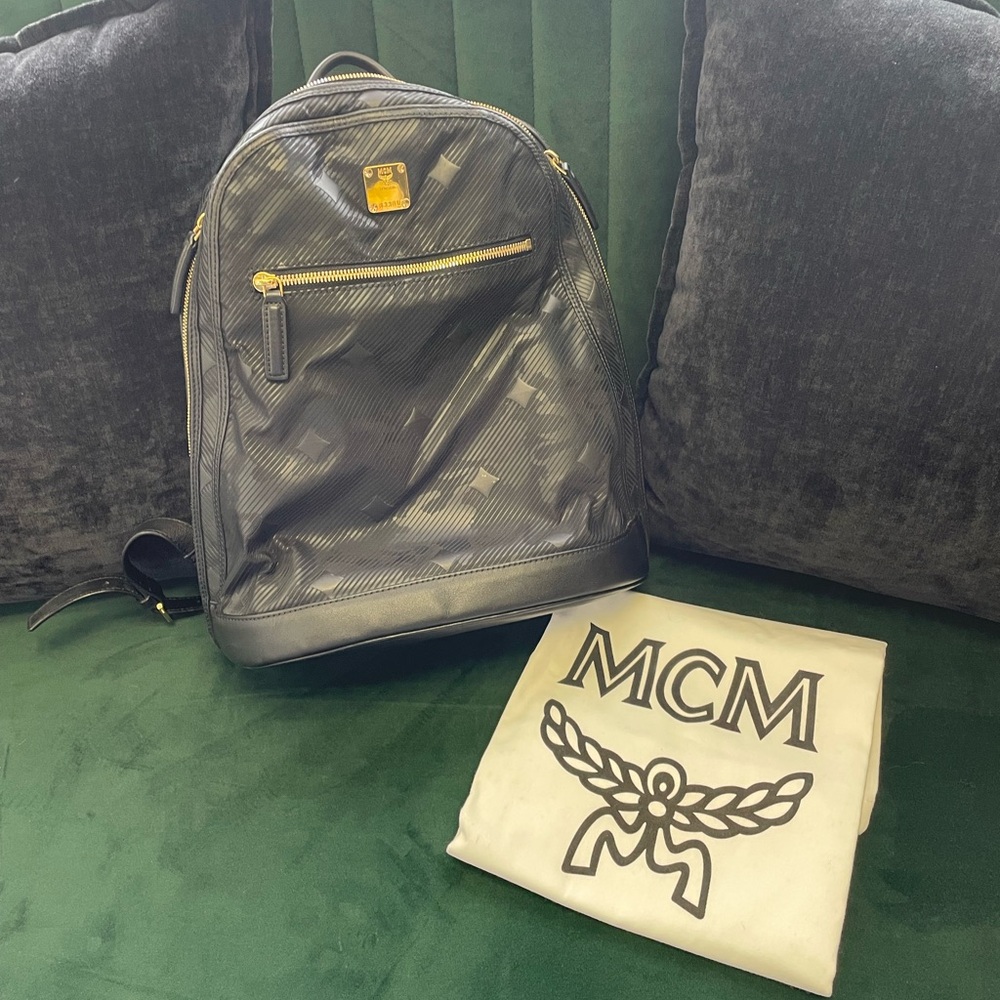MCM Black Backpack with Gold Details